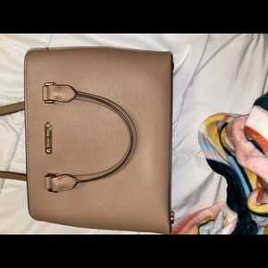 Medium sized brown Micheal Khors bag